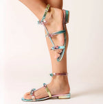 Load image into Gallery viewer, The Bow Gladiator Sandal in Rainbow Metallic
