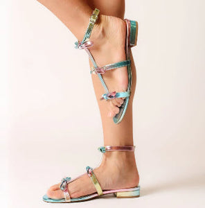 The Bow Gladiator Sandal in Rainbow Metallic
