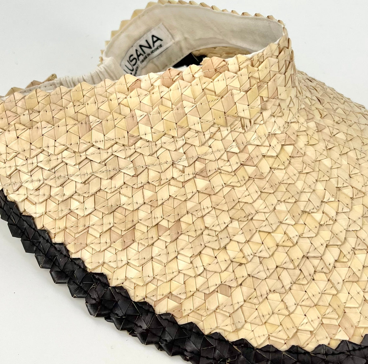 The Woven Straw Visor in Natural Black