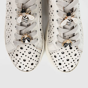 The Perforated Sneaker with Bug Ornaments in Marshmallow