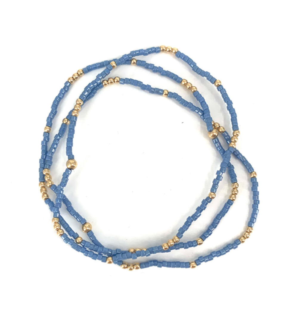 The Set of Three Bead Stretch Bracelets in Steel Blue