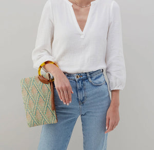 The Geometric Straw Clutch in Natural Green
