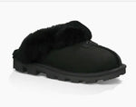 Load image into Gallery viewer, Ugg Coquette - The Classic Ugg Slipper in Black. Nothing feels cozier than this Ugg classic slipper mule. Perfect for when you are working from home or walking the dog. Suede sheepskin upper &amp; sock lining, lighweight full rubber sole.
