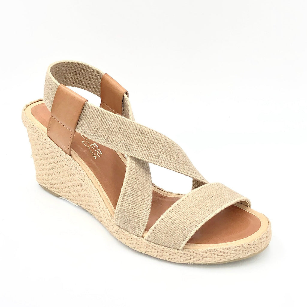 Casteller 30010 - The Elastic Espadrille Sandal in Natural Linen. Go anywhere in this classic top selling elastic espadrille on mid wedge. The elastic upper fits & flatters all types of feet and offers a great deal of comfort.