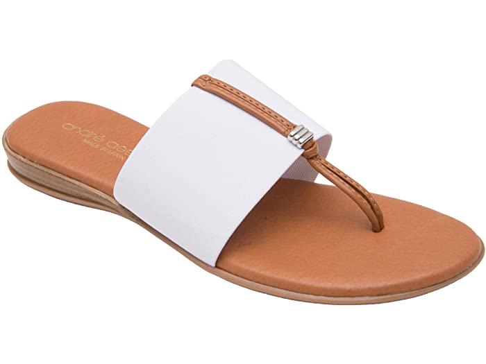Nice - The Elastic Thong Sandal in White Andre Asssous Slide on and go. The single white elastic band works with any outfit. The memory foam insole makes these as comfortable as they are easy. Walking. Lunching. Boardwalk, brunch, dinner. Easy Breezy.