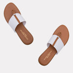 Load image into Gallery viewer, easy flat walking sandal in white comfortable memory foam nice 802568852066  802568852059  802568852042  802568852035  802568852028  802568852011  802568852004 Slide on and go. The single white elastic band works with any outfit. The memory foam insole makes these as comfortable as they are easy. Walking. Lunching. Boardwalk, brunch, dinner. Easy Breezy. Andres Assous
