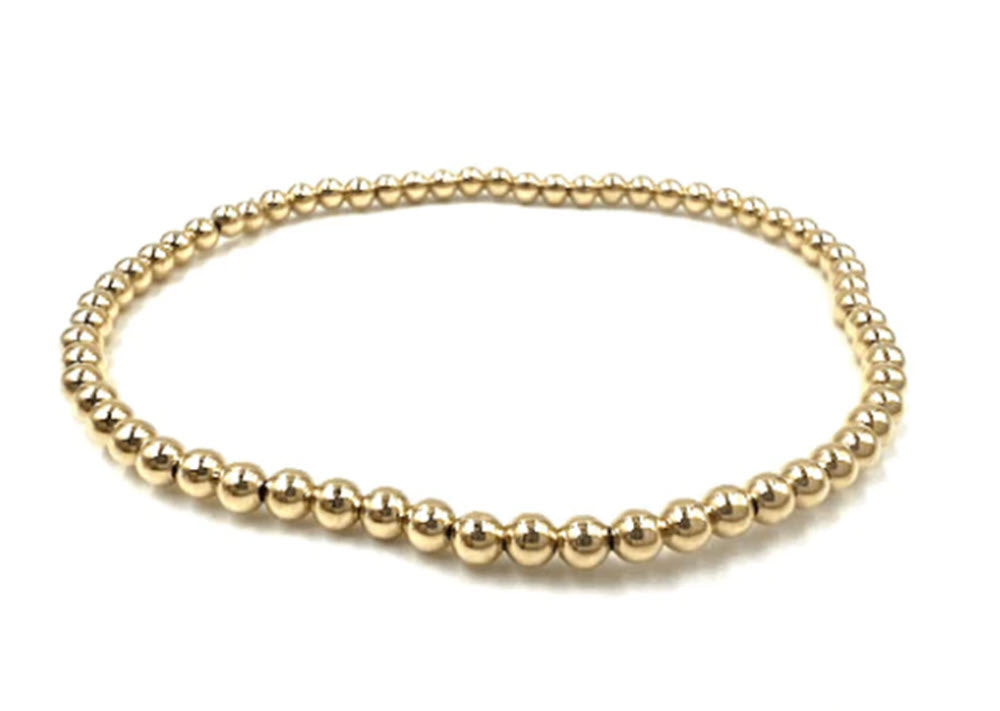The Single Bead Stretch 3mm Bracelet in Gold