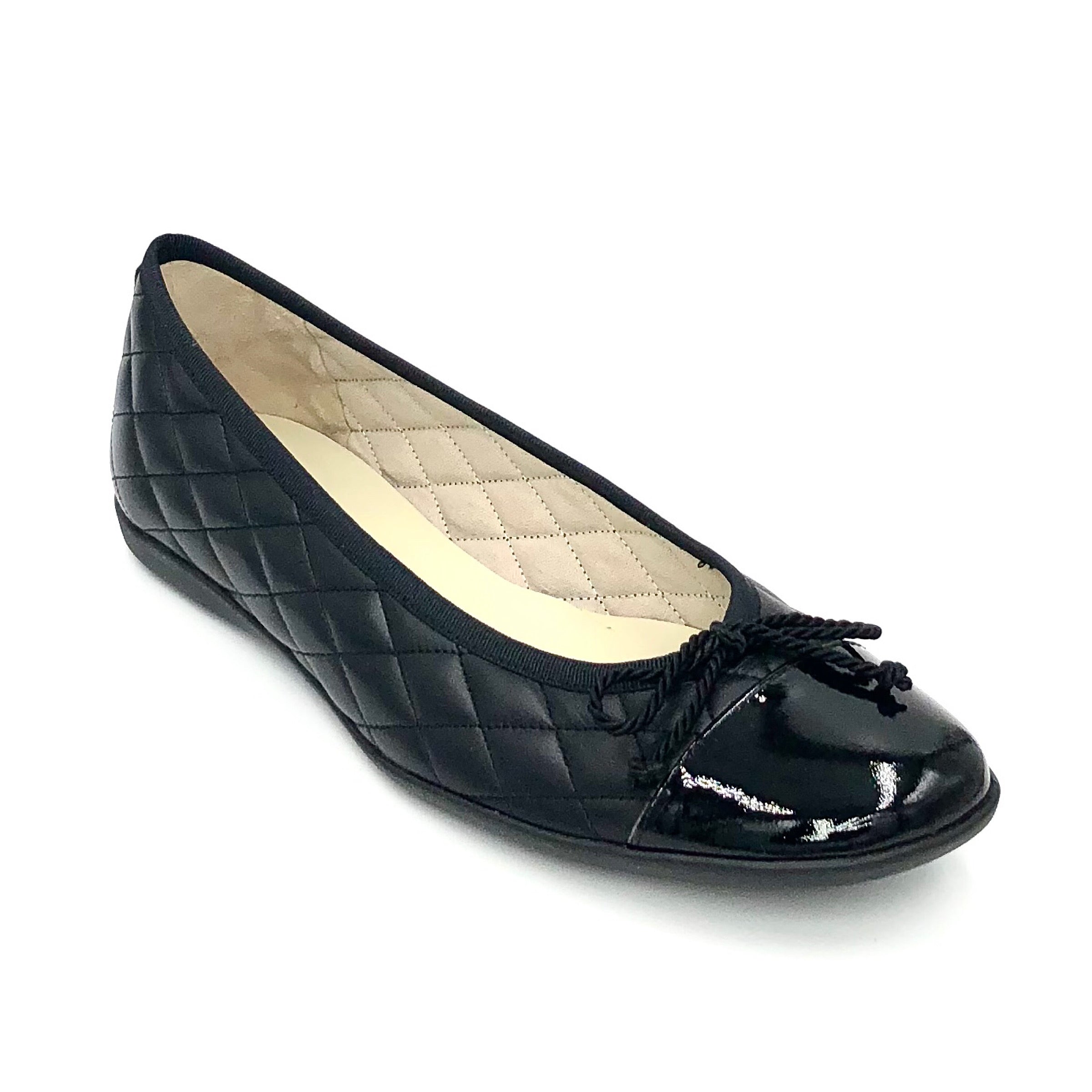 Passport - The Quilted Cap Toe Ballet in Black,. You will simply love this best selling classic ballet flat with adjustable tie. It is a must for everyone's shoe closet! Supple quilted leather upper, patent leather cap toe, leather lining & full rubber sole.