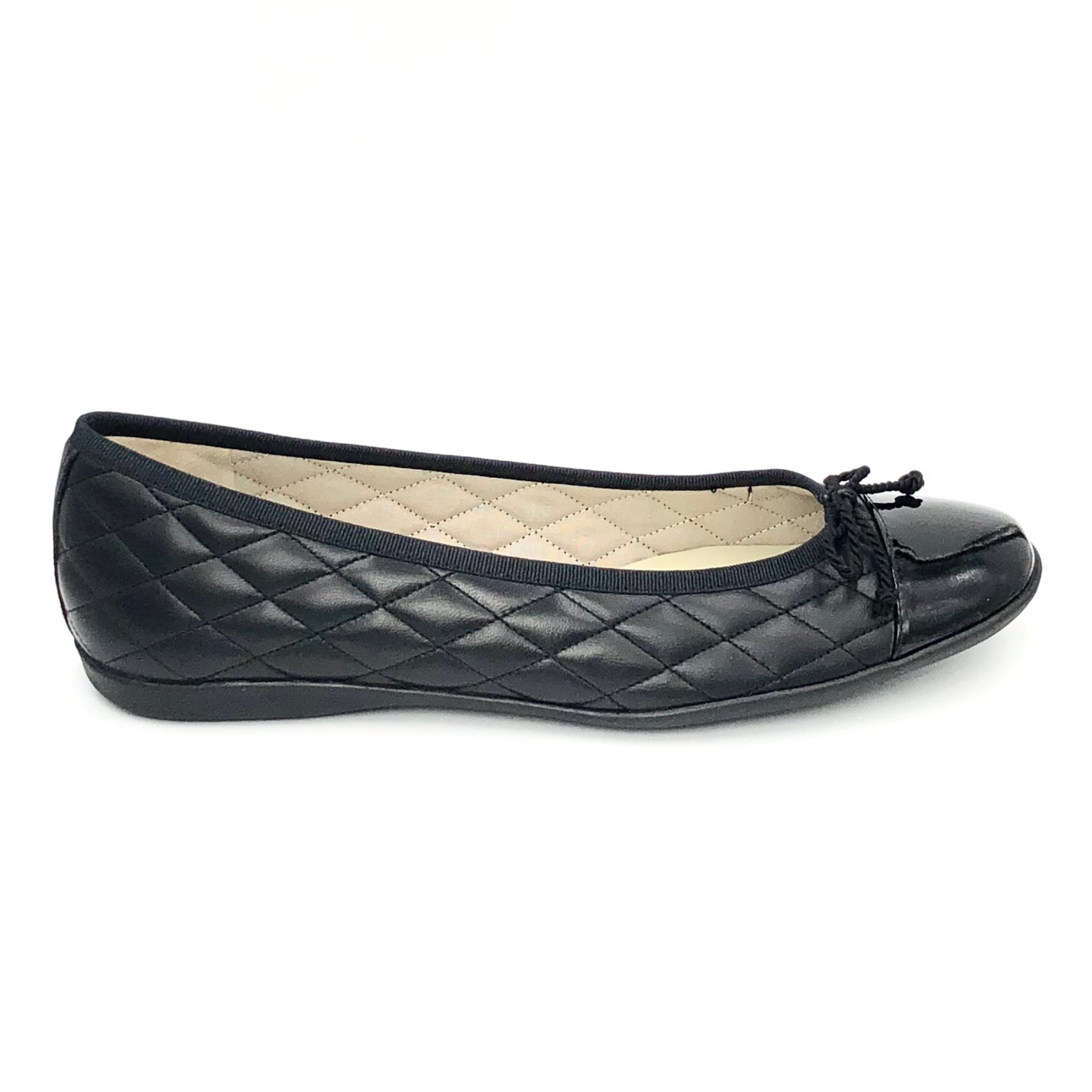 black womens dress flats The Quilted Cap Toe Ballet in Black
