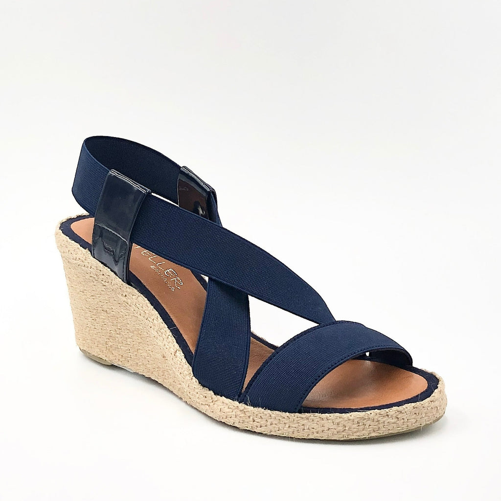 The Elastic Espadrille Sandal in Navy Go anywhere in this classic top selling elastic espadrille on mid wedge. The elastic upper fits & flatters all types of feet and offers a great deal of comfort.