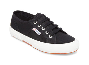 Superga 2750 - The Classic Lace Sneaker in Black. Classic never goes out of style. Simple, flattering, lace up silhouette. Washable canvas. Very comfortable. This is one sneaker you can wear all summer and beyond. Timeless.